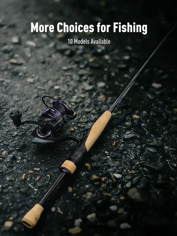 Spinning fishing rod with cork handle and attached black reel on a rock surface