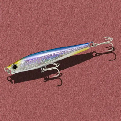 Lipless minnow fishing lure, iridescent purple-blue body with silver scales and three treble hooks