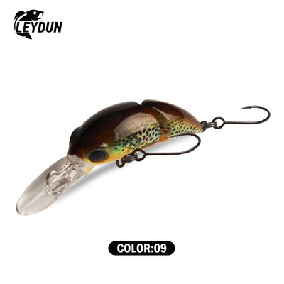 Floating minnow crankbait lure, dark brown back with gold accents, two treble hooks