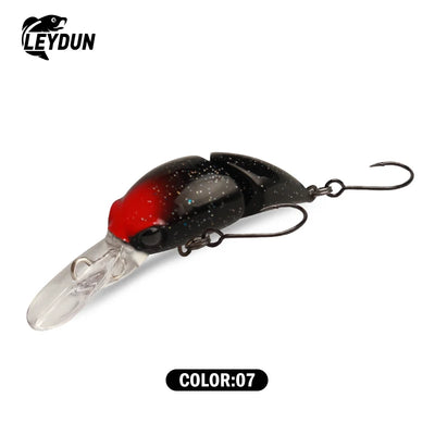 Floating minnow crankbait lure, black body with red head and clear tail, two treble hooks