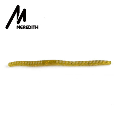 Yellow-gold silicone worm fishing lure with ribbed body and sparkle