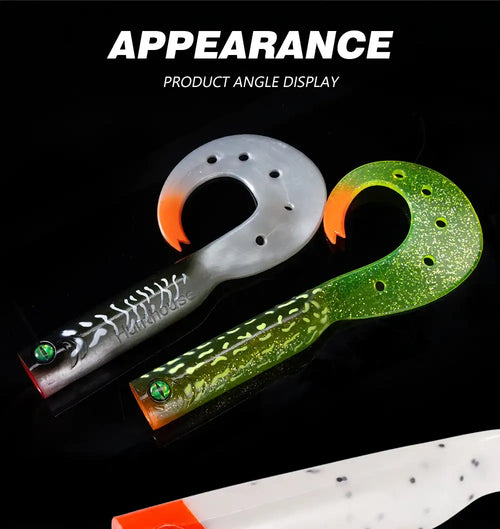Two silicone swimbait trailer tails: white and green with orange fin accents