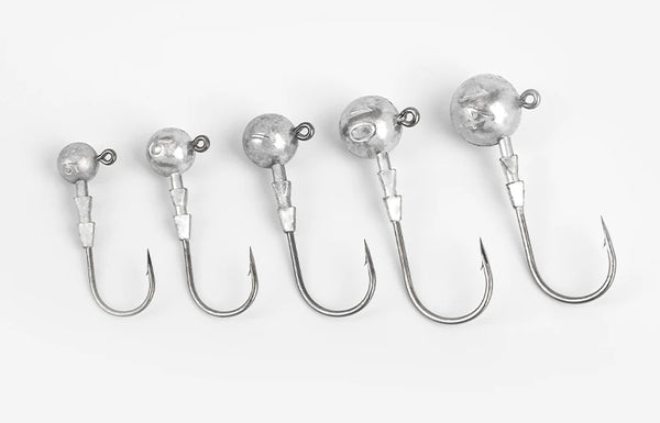 Set of five triple-edge lead head jig hooks with silver lead heads and curved hooks