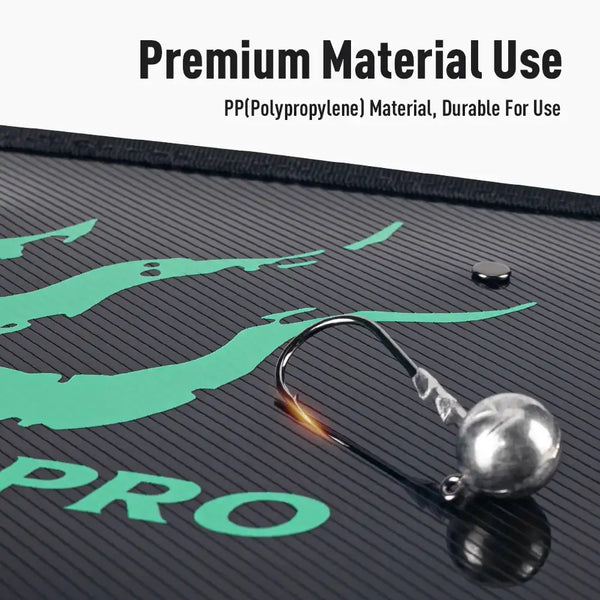 Black PP material panel with green squid graphic and lure sinker on top