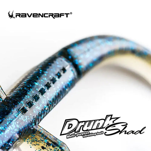 RAVENCRAFT Drunk Shad soft shakier slow sinking fishing lure in blue and silver glitter with segmented textured body