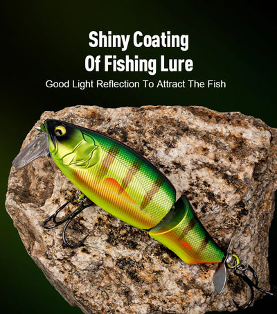 Green and yellow shiny fishing lure with red stripe, propeller tail, and treble hooks
