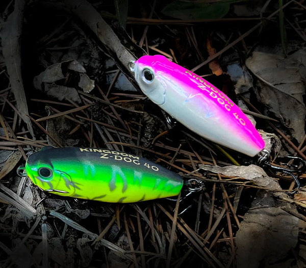 Floating pencil topwater lure pair: pink-white body and neon green body with treble hooks