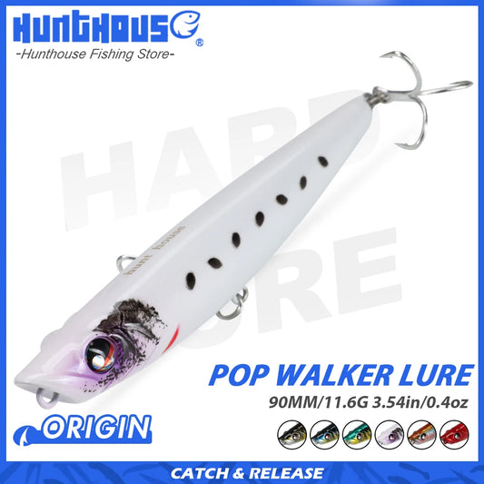 Floating topwater popper lure, white with purple head, black dots, two treble hooks