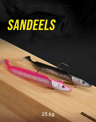 Soft paddle tail fishing lure, pink glitter body with gray head and treble hook.