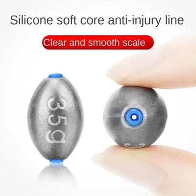 Gray olive lead sinkers with blue plastic core, marked 35g and 30g