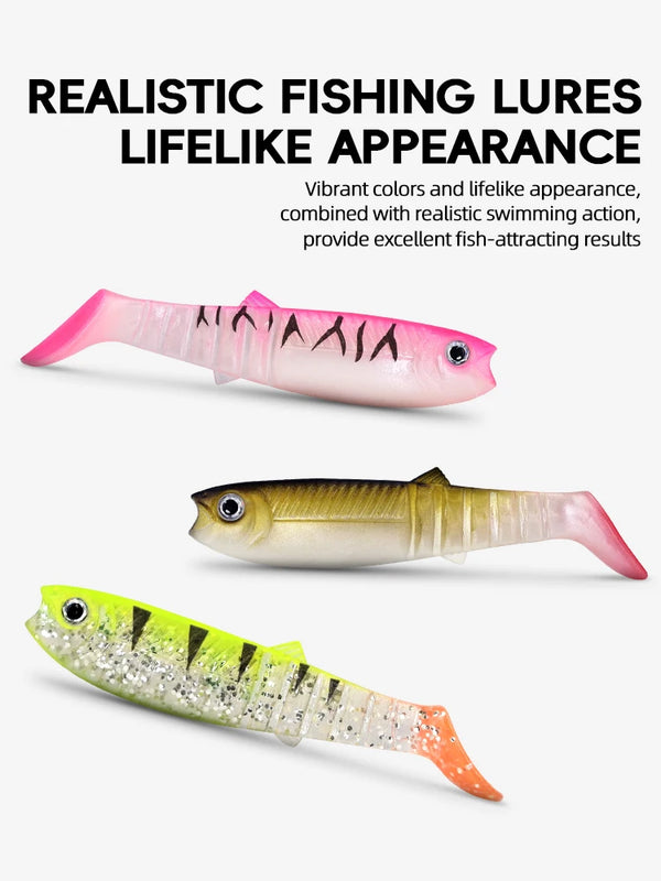 Three paddle tail swimbaits: pink, gold, and chartreuse-green with speckle details.
