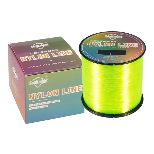 Neon yellow-green nylon fishing line spool with product box.