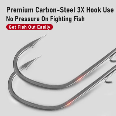 Curved carbon-steel jig hooks with barbed tip, close-up