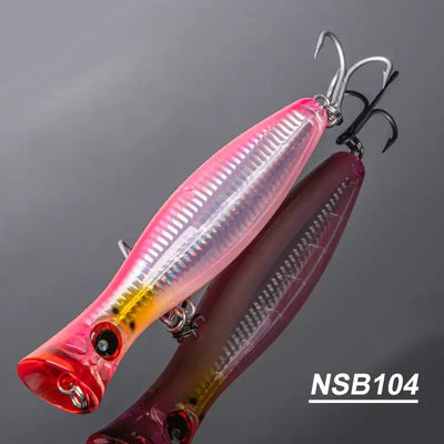 Pink and orange gradient topwater popper hard bait with treble hooks