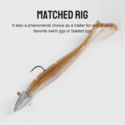 Shad-style silicone swimbait with jig head, gold-brown glitter body and curved tail.