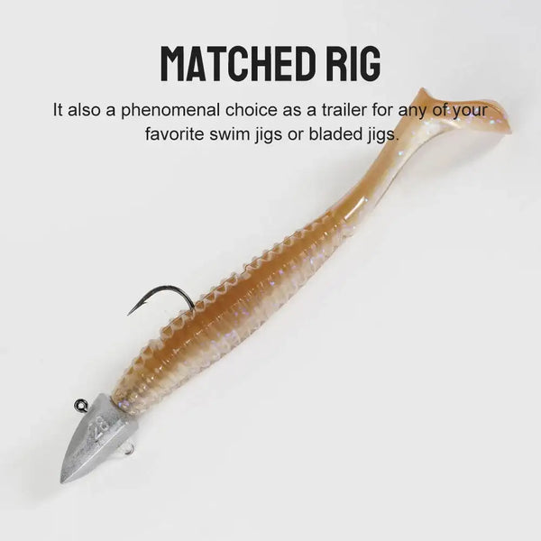 Shad-style silicone swimbait with jig head, gold-brown glitter body and curved tail.