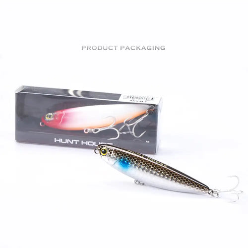 Topwater pencil lure in retail box, blue-silver body with treble hooks