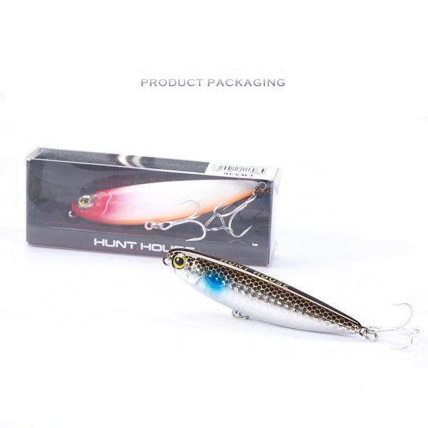 Topwater pencil lure in retail box, blue-silver body with treble hooks