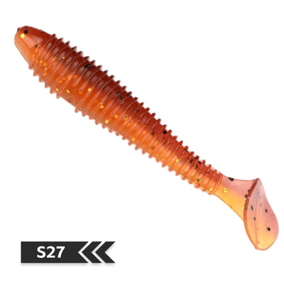 Soft T-tail silicone fishing lure, orange translucent ribbed body with speckle glitter
