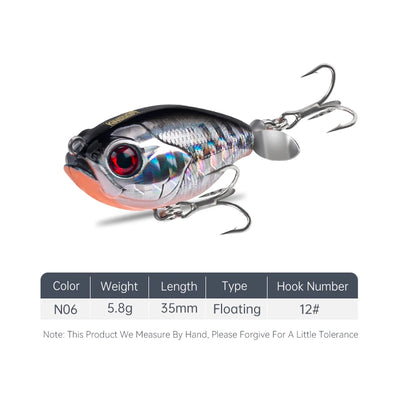 Floating topwater lure, silver-blue body with red eye and orange accents, treble hooks