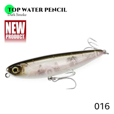 Floating pencil fishing lure in dark smoky gray with gold eye and treble hooks