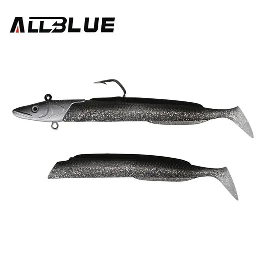 Soft paddle tail fishing lure in dark gray/silver with open hook and lure body.