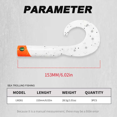 White soft fishing lure with orange head and black speckled tail, single trailer.
