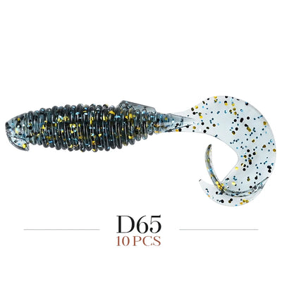 Soft fishing lure with dark blue speckled body and white flapper tail, labeled D65