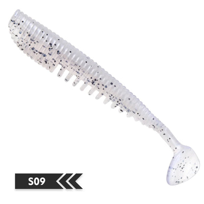 Soft silicone shad fishing lure, white with blue speckles, curved paddle tail