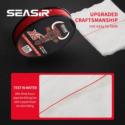 Red braided fishing line spool beside a folded paper test card