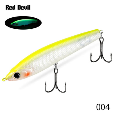 Topwater pencil fishing lure, neon yellow and white with multiple treble hooks.