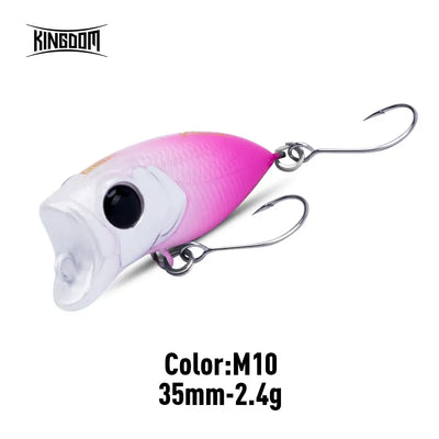 Pink and white topwater popper fishing lure with two treble hooks