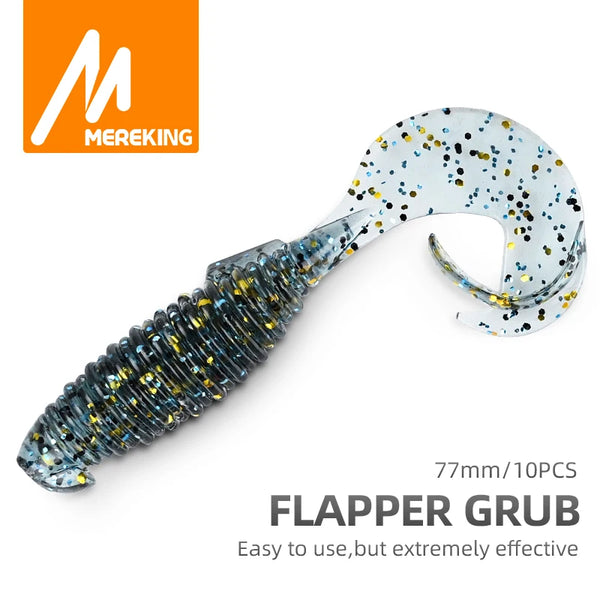 Soft fishing lure grub, white with blue speckled paddle tail and ribbed body, 77mm