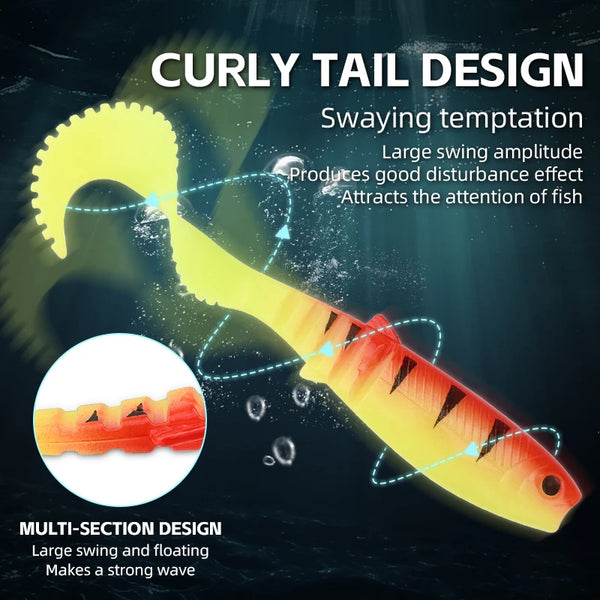 Curly-tail soft swimbait lure, red-orange shad body with chartreuse curled tail.