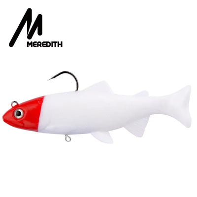 Weighted soft swimbait lure, red-and-white body with 3D eyes and T-tail