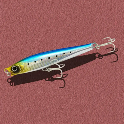 Blue-and-silver lipless minnow sinking lure with speckled pattern and treble hooks