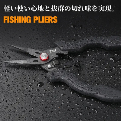 Wet black-handled fishing pliers with stainless jaws and red pivot knob