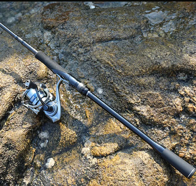 Spinning fishing rod with black foam grip and mounted reel, dark blue finish