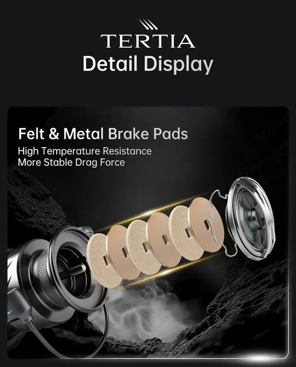 Spinning fishing reel with felt and metal brake pads and front drag assembly