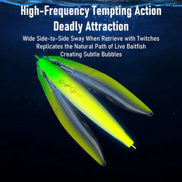Yellow-green and silver sinking pencil lure with treble hooks for saltwater fishing.