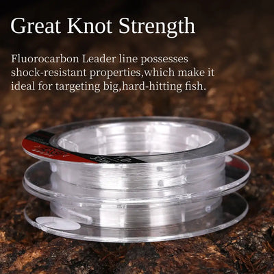 Fluorocarbon fishing line spool with EX8 label on forest ground