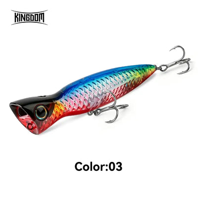 Blue-green-red topwater popper lure with black head and two treble hooks