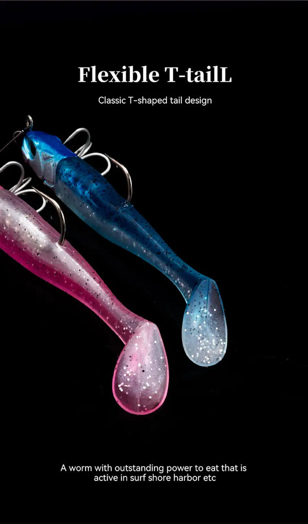 Soft T-tail fishing lures in pink and blue with treble hooks and speckled glitter
