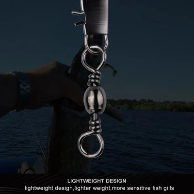 Snap swivel fishing connector on a spring swivel with two metal snap rings