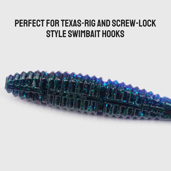 Blue-green iridescent glitter silicone swimbait with ribbed body and fork tail.