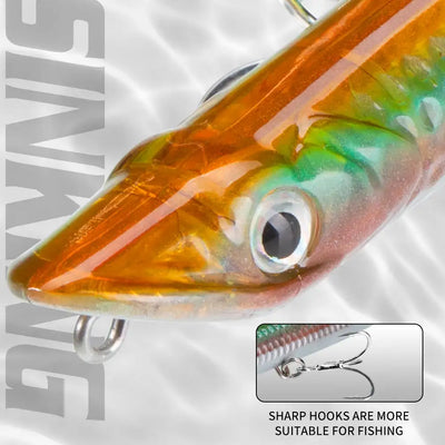 Orange and green pencil topwater lure close-up with large front eye and treble hook
