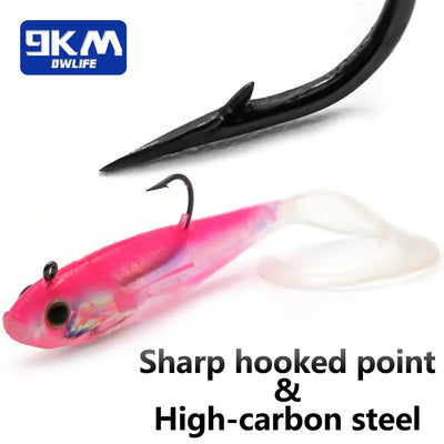 Pink soft paddle-tail swimbait lure with jig head and sharp black hook