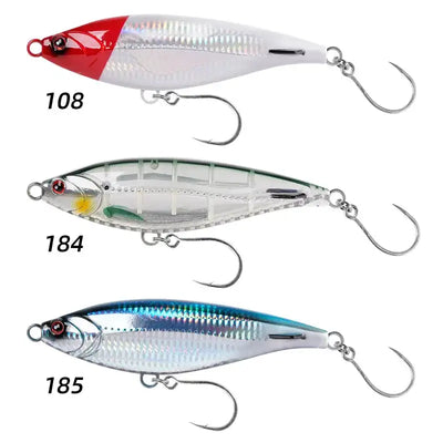 Three stickbait lures: red-white, clear shad, and blue-silver with treble hooks