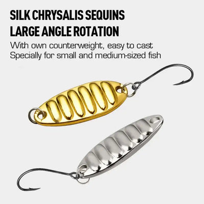 Ribbed gold and silver spinner spoon lures with single hooks.