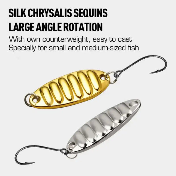 Ribbed gold and silver spinner spoon lures with single hooks.